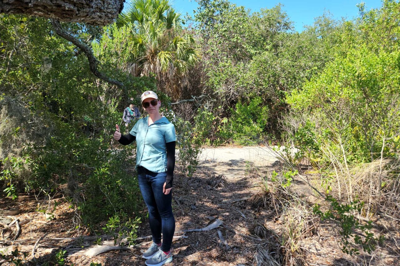 Domonique amongst the trees. Tree Island Emergence Research Projects — Seminole Tribal Historic Preservation Office